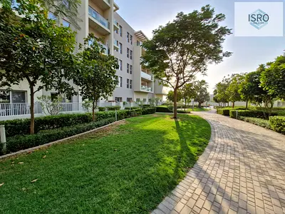 Spacious 1BR Apartment with private garden in al zahia community