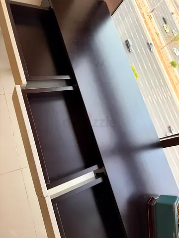 Dark wood console with drawers