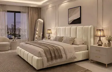 Modern upholstered king bed with padded headboard in cream