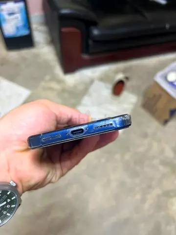 Used Apple iPhone (shows bottom frame wear) - Good working condition