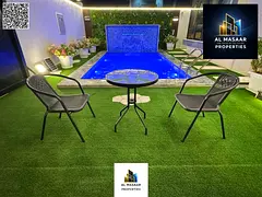 Luxury villa with swimming pool in Al Amerah area, Ajman. Price includes electricity, water, and air
