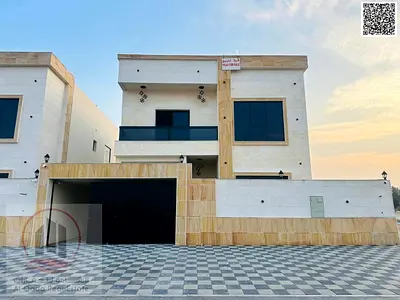 For sale, a villa in Ajman Al Helio, 5 master rooms, a Majles room, a hall, and a maid’s room, freehold for all nationalities, Installment with out do