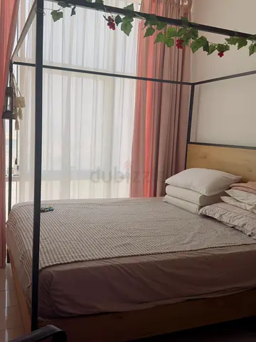 Wooden Queen Bed with Canopy Frame — Good Condition