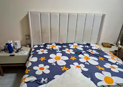 Queen upholstered headboard - light grey, good condition