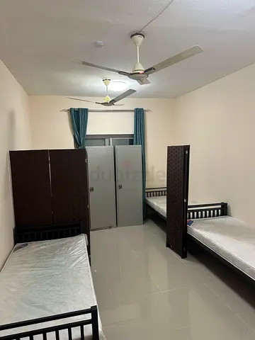Executive Bedspace for Gents with divider partition, opp.Nesto Mia Mall,Facing Sahara,Al nahda shaj