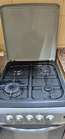 Used freestanding cooker with oven and 4 burners - good working condition