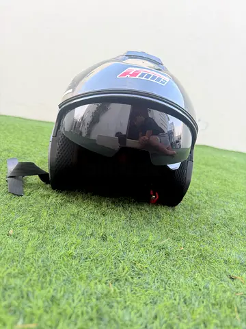 Black and white helmet compatible size bought for 200 aed