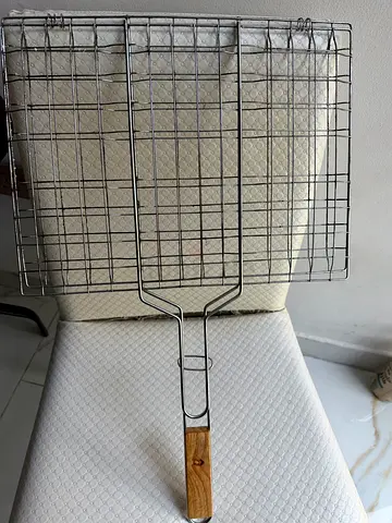 Pair of stainless steel grilling baskets with wooden handles - used