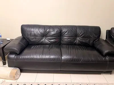 Black leather 3-seater and single sofa in good used condition