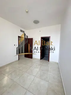 Writing Stunning 2-Bedroom Apartment for Annual Rent in Al Majaz