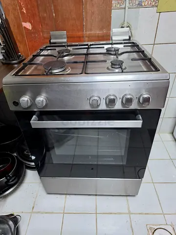 Stainless Steel Gas Cooker with Oven - 4 Burners, Good Working Condition - whirlpool