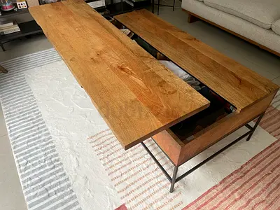 West Elm - Solid wood coffee table with black metal frame - good condition - industrial collection