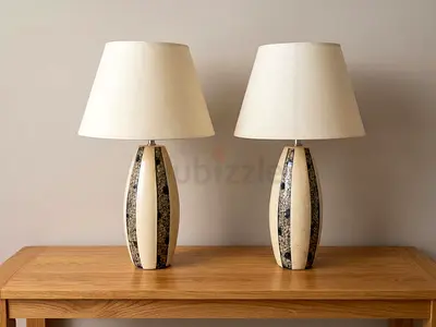 Pair of ceramic table lamps with cream shades