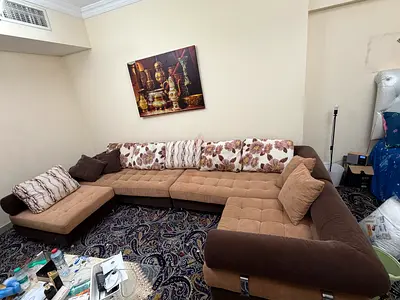 L-shaped sectional sofa in beige and brown – good condition