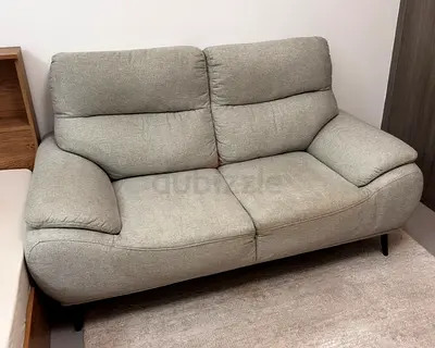 Compact 2-seater fabric sofa in light grey — Very Good Condition