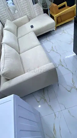 Light beige 4-seater sofa in good condition