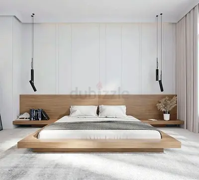 Minimalist floating platform king bed with integrated headboard and side shelves