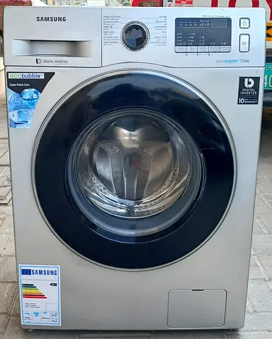 this is 7kg Samsung washing machine, eco bubble technology, working properly, its color is silver.