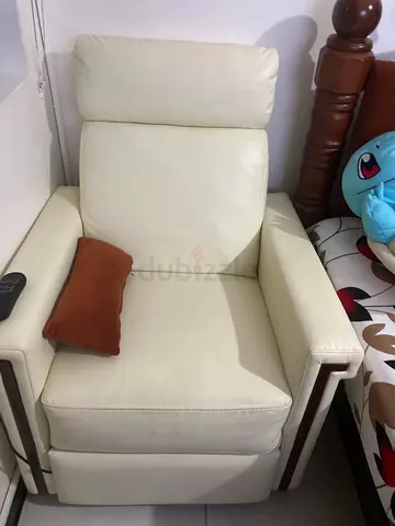 Cream Leather Recliner Armchair with Wooden Accents - Good Condition