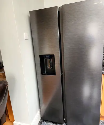 Samsung Side-by-Side Refrigerator with Water Dispenser - Good Condition