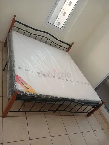 New King size wooden Steel bed Available