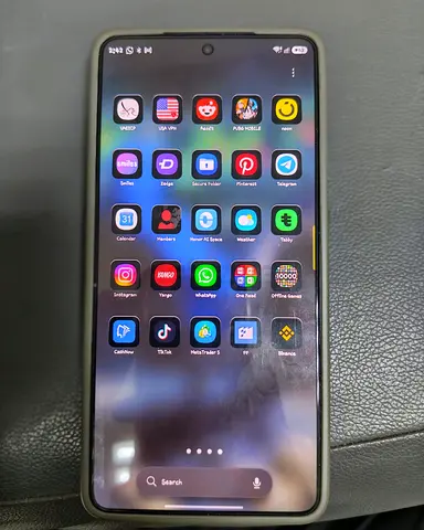 Used Samsung smartphone with protective case — good working condition