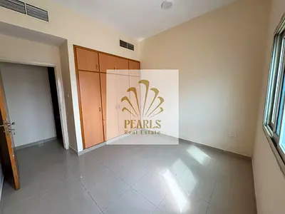 For annual rent in Ajman Al Nuaimiya 1 behind Casa Cafe, 2 bedrooms and hall, 2 bathrooms, central