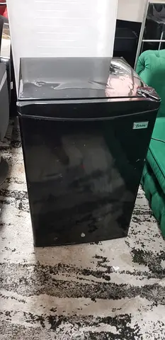 Compact black mini fridge - good working condition
