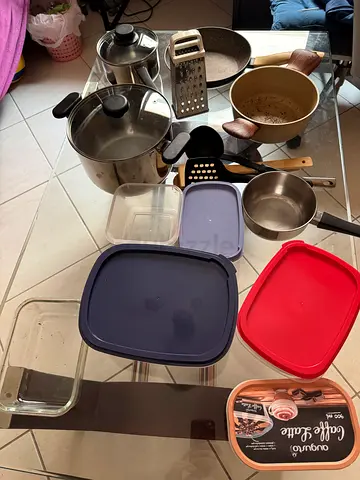 Used assorted kitchen pots, pans, lids and food storage containers