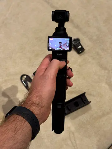 DJI Osmo Pocket 3 handheld gimbal camera with case and accessories