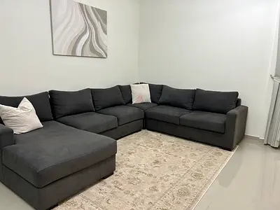 Dark Grey L-shaped Fabric Sofa with Chaise - Good Condition