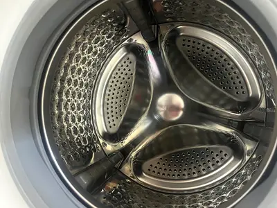 Top-loading washing machine drum in good condition