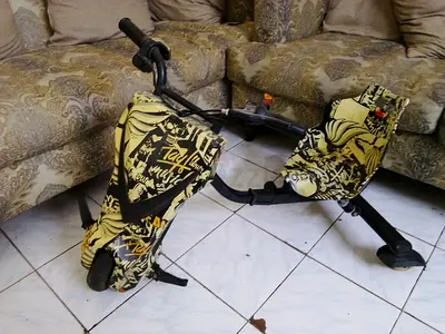 Used Drifting Trike / PlasmaCar-style Ride-On Toy - Yellow Graphic