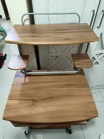 Compact wooden computer desk with keyboard tray and shelves - good condition