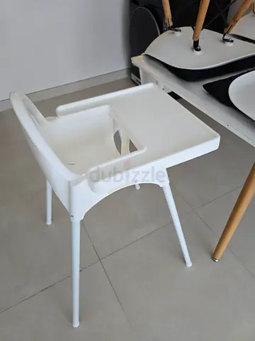 White plastic, washable baby high chair (compact, easy-clean)