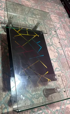 Modern Glass Coffee Table with Geometric Base Pattern