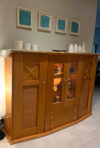 Wooden display cabinet with glass doors and woven panels - good condition