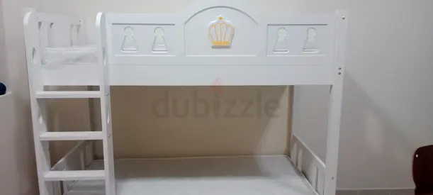 White wooden bunk bed for kids with ladder