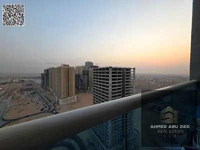 2BR hall in Golf Tower, Emirates City, on Sheikh Mohammed Bin Zayed Road, easy access to Dubai and Sharjah, two bathrooms, yearly rent AED 38,000, 4–6