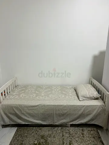 Single wooden daybed with mattress and bedding - good condition