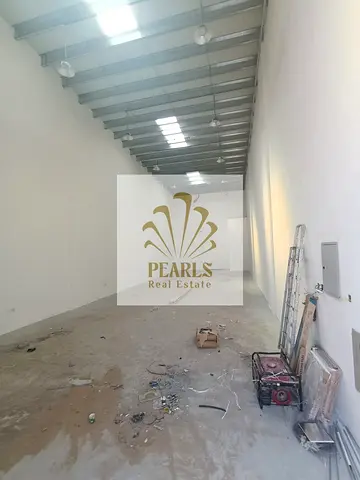 4 warehouses for annual rent in Al Jurf Industrial 2, 1,700 sq ft, 22 KW, 3-phase power, near Sheikh Mohammed Bin Zayed Road and Dubai & Sharjah exits