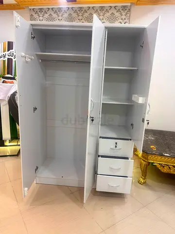 White 3-Door Wardrobe with Shelves and Drawers - Good Condition