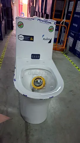 New one-piece ceramic toilet - unused, still with packaging