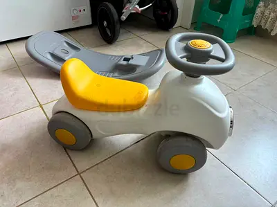 Little ride-on car for toddlers - sturdy push toy, gray and yellow