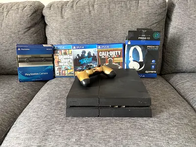 Sony PS4 Slim with Controller, Camera, Headset and 3 Games — Good Condition