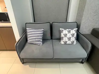 Grey 2-seater sofa in good condition