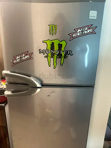 Silver double-door refrigerator, good working condition