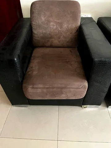 Single brown suede sofa chair with black faux-croc armrests - used