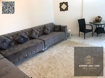 Furnished 1BR hall in Al Waha Towers with gym, pool, clean furniture, fully equipped, prime location near services and Dubai/Sharjah exit, yearly rent