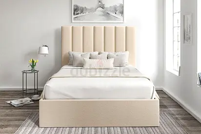 Beige Queens size bed with mattress